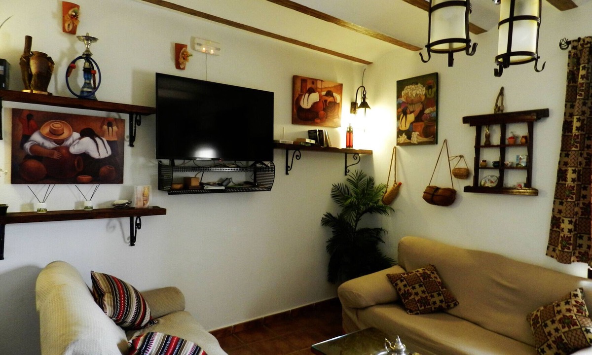 Cuevas del Campo House | Casa Triana with Mountain View, Shared Pool, Terrace & Wi-Fi