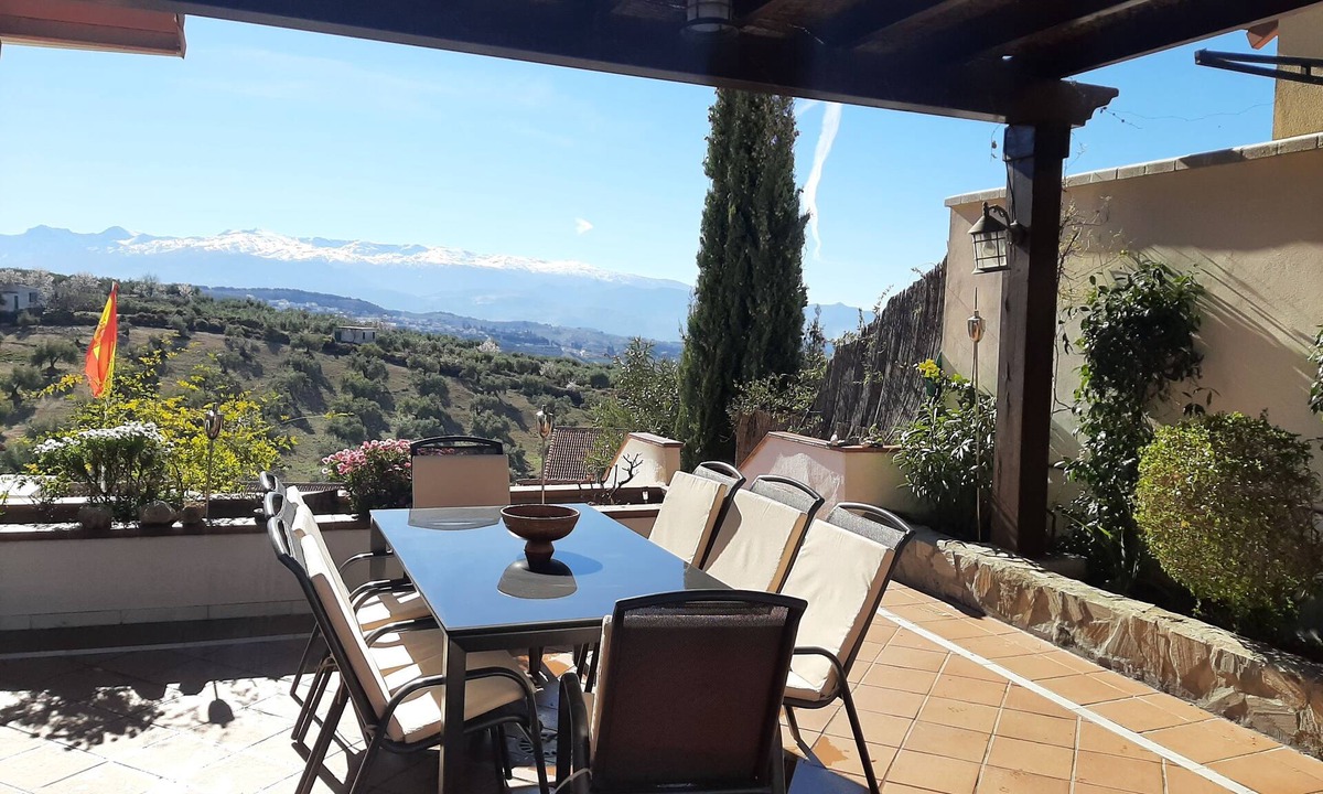 Nivar Ski Chalet | Villa Alfaguara is a rural house with views of the Sierra Nevada for 14 people