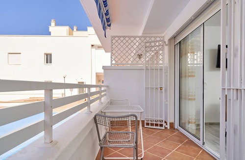Polopos Apartment | Apartment "Espectacular Duplex Costa Tropical" with Sea View, Shared Pool & Wi-Fi