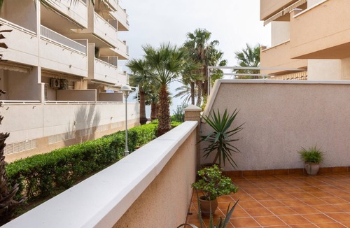 Castell de Ferro Apartment | Apto Castell Beach. Apartment with a spacious seaside terrace.