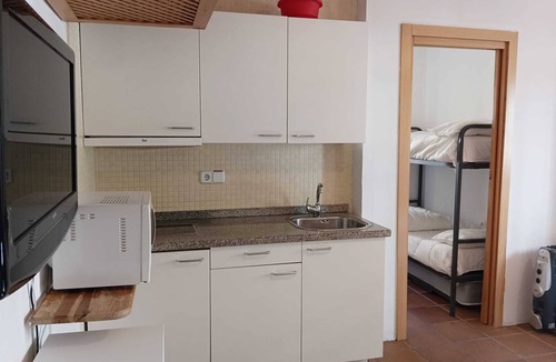 Pradollano Apartment | Arttyco Sierra Nevada building studio with pool, sauna and jacuzzi