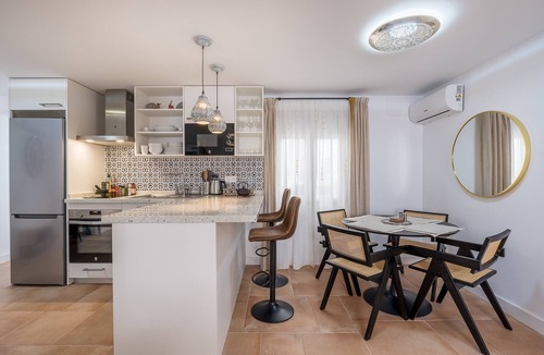 San Pedro Apartment | Casa al Andalus: Chic, Serene & Posh City Center Pad with WiFi and air conditioning!