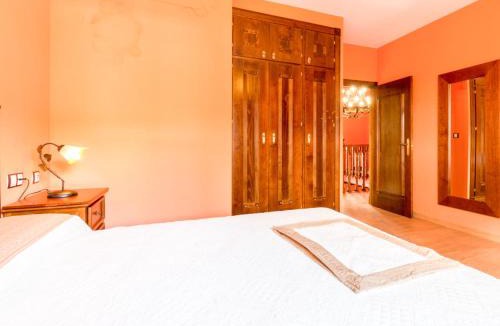 Niguelas Villa | Casa rosa del romeral