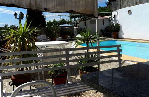 Cuevas del Campo House | Casa Triana with Mountain View, Shared Pool, Terrace & Wi-Fi