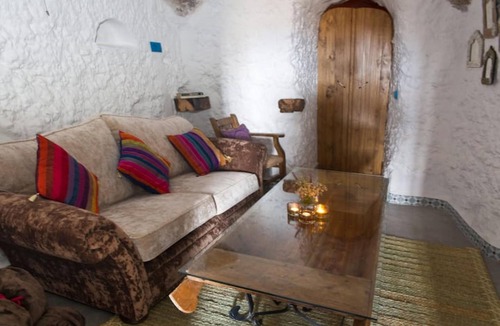 Los Balcones House | Holiday Home 'Cueva Balcones de Piedad - Granado' with Terrace, Shared Pool & Wi-Fi