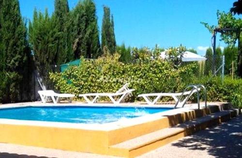 Chimeneas Villa | Homerez - Villa for 13 ppl. with swimming-pool, garden and terrace at Chimeneas