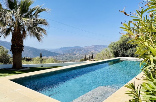 Carataunas House | The Glass House - An elegant, minimalist villa and pool with beautiful views.