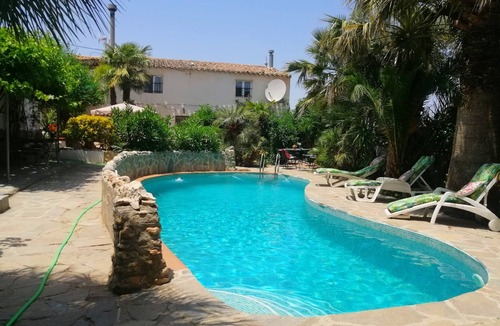 Cullar Apartment | Tropical oasis, rural Andalucía—tropical garden, huge pool, perfect for couples
