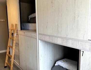 Single Bed in Dormitory Room